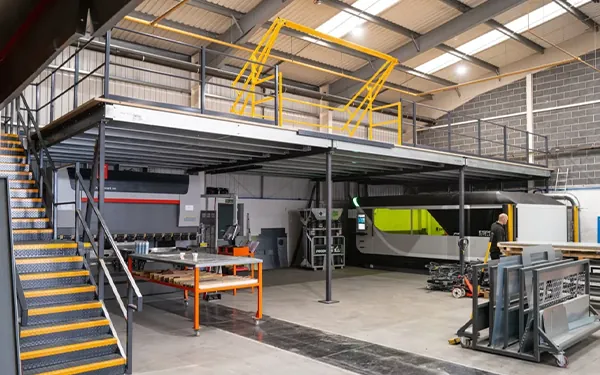 Industrial steel mezzanine floor with staircase